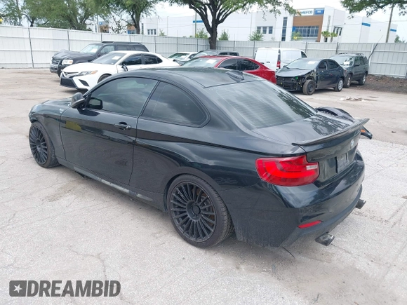 2015 BMW 2 Series M235i with VIN WBA1J7C5XFV289284, listed as a IAAI auction lot 42626668 with 179,944 mi miles and . Bid and sale history available at DreamBid. Image 3.