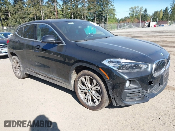 2018 BMW X2 xDrive28i with VIN WBXYJ5C30JEF69802, listed as a IAAI auction lot 42061382 with 55,138 mi miles. Bid and sale history available at carsss.com. Image 1.