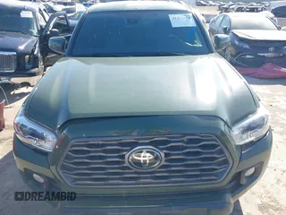 2021 Toyota Tacoma 4WD SR5 with VIN 3TMDZ5BN2MM101265, listed as a IAAI auction lot 41272874 with 51,989 mi miles. Bid and sale history available at carsss.com. Image 13.