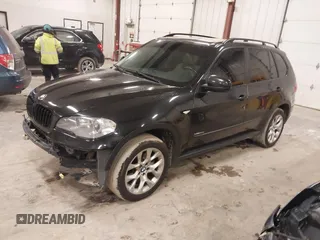 2012 BMW X5 35i with VIN 5UXZV4C55CL990510, listed as a IAAI auction lot 41849293 with 117,522 mi miles and . Bid and sale history available at DreamBid. Image 17.