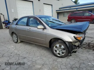 2009 Kia Spectra EX with VIN KNAFE222095618177, listed as a Copart auction lot 71357534 with 132,655 mi miles and Salvage Title. Bid and sale history available at carsss.com. Image 4.