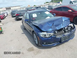 2018 BMW 3 Series 320i with VIN WBA8E1G56JNU92997, listed as a IAAI auction lot 42039869 with 105,085 mi miles. Bid and sale history available at carsss.com. Image 1.