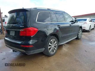 2013 Mercedes-Benz GL-Class GL 450 with VIN 4JGDF7CE4DA237229, listed as a IAAI auction lot 41912216 with 144,333 mi miles. Bid and sale history available at carsss.com. Image 4.