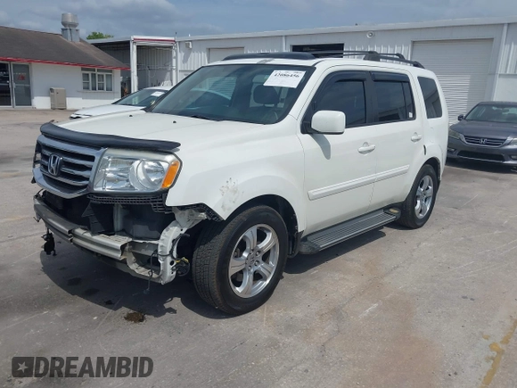 2014 Honda Pilot EX-L with VIN 5FNYF4H52EB055549, listed as a IAAI auction lot 42086456 with 292,594 mi miles and . Bid and sale history available at carsss.com. Image 2.