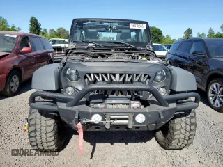 2015 Jeep Wrangler Unlimited Freedom with VIN 1C4BJWDG8FL689194, listed as a Copart auction lot 58016385 with 108,026 mi miles and Salvage title. Bid and sale history available at DreamBid. Image 5.