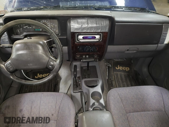 1997 Jeep Cherokee Country with VIN 1J4FJ78S0VL592781, listed as a Copart auction lot 83209464 with 287,206 mi miles and Salvage Title. Bid and sale history available at carsss.com. Image 8.