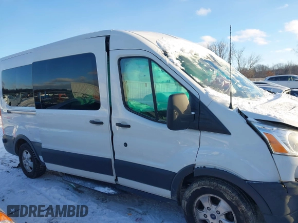 2018 Ford Transit Passenger XL z VIN 1FBAX2CM1JKA97858, wystawiony jako IAAI lot #41285058 z przebiegiem 252 805 mil mil oraz . Historia ofert i sprzedaży dostępna na DreamBid. Obrazek 13.
