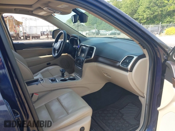 2014 Jeep Grand Cherokee Limited with VIN 1C4RJFBG4EC294512, listed as a IAAI auction lot 42559481 with 131,034 mi miles and . Bid and sale history available at DreamBid. Image 5.