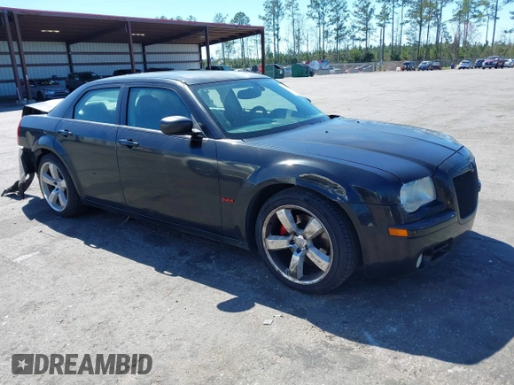 2005 Chrysler 300 with VIN 2C3AA63HX5H649107, listed as a IAAI auction lot 41748562 with 173,803 mi miles. Bid and sale history available at carsss.com. Image 1.