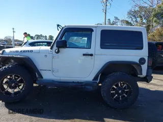 2014 Jeep Wrangler Sport with VIN 1C4AJWAG0EL245337, listed as a IAAI auction lot 41532314 with 140,721 mi miles and . Bid and sale history available at DreamBid. Image 14.