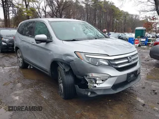 2017 Honda Pilot EX-L with VIN 5FNYF6H51HB069068, listed as a IAAI auction lot 41567728 with 100,618 mi miles and . Bid and sale history available at DreamBid. Image 6.