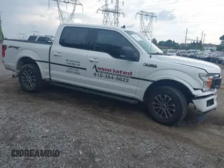 2019 Ford F-150 XL with VIN 1FTEW1EP3KFD24897, listed as a IAAI auction lot 42546399 with 137,717 mi miles and . Bid and sale history available at DreamBid. Image 1.