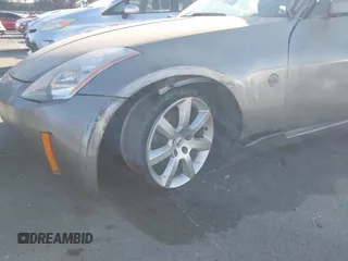 2004 Nissan 350Z Touring with VIN JN1AZ34E84T060682, listed as a IAAI auction lot 41616199 with 209,814 mi miles. Bid and sale history available at carsss.com. Image 12.