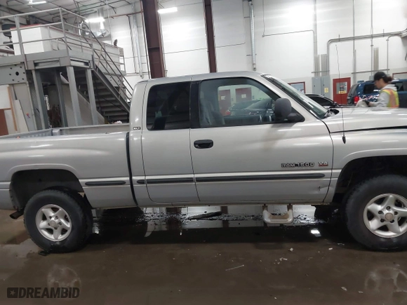 1999 Dodge Ram 1500 with VIN 1B7HF13Z1XJ547042, listed as a IAAI auction lot 41480882 with 101,270 mi miles. Bid and sale history available at carsss.com. Image 14.
