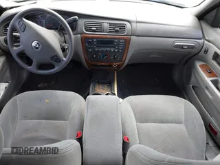 2003 Mercury Sable GS z VIN 1MEFM50U93G635100, wystawiony jako IAAI lot #42424689 z przebiegiem 231 397 mil mil oraz . Historia ofert i sprzedaży dostępna na DreamBid. Obrazek 13.