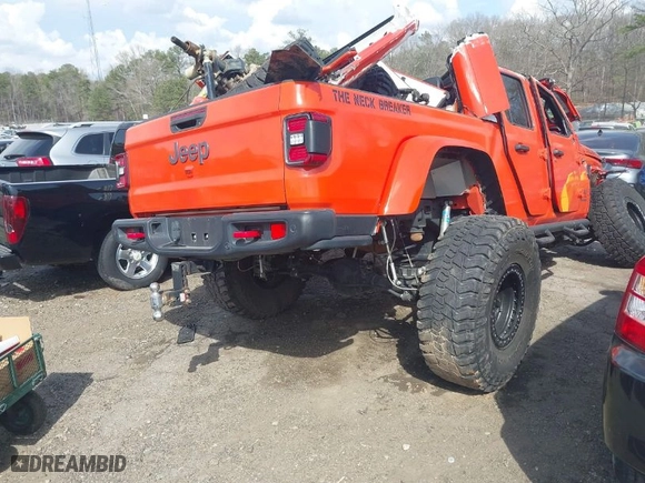 2020 Jeep Gladiator Rubicon with VIN 1C6JJTBG0LL164890, listed as a IAAI auction lot 41795545 with 77,860 mi miles. Bid and sale history available at carsss.com. Image 4.