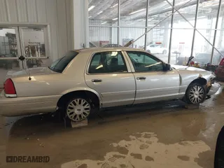 2005 Ford Crown Victoria LX with VIN 2FAFP74W95X158705, listed as a IAAI auction lot 41593553 with 276,940 mi miles. Bid and sale history available at carsss.com. Image 13.