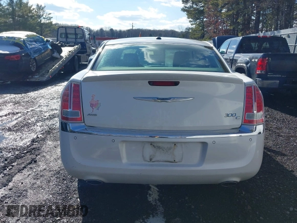 2013 Chrysler 300 with VIN 2C3CCAKGXDH733148, listed as a IAAI auction lot 41541442 with 216,074 mi miles. Bid and sale history available at carsss.com. Image 16.