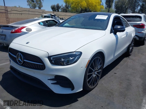 2022 Mercedes-Benz E 450 with VIN W1K1J5JB9NF173816, listed as a IAAI auction lot 42394337 with 34,251 mi miles and . Bid and sale history available at DreamBid. Image 2.