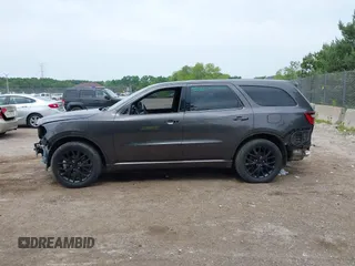 2015 Dodge Durango SXT with VIN 1C4RDJAG0FC947060, listed as a IAAI auction lot 42505938 with 124,705 mi miles and . Bid and sale history available at DreamBid. Image 14.