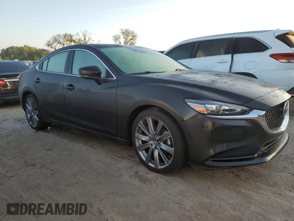 2021 Mazda 6 Touring with VIN JM1GL1VM7M1614986, listed as a Copart auction lot 73731794 with Not Provided miles and Salvage Title. Bid and sale history available at DreamBid. Image 4.