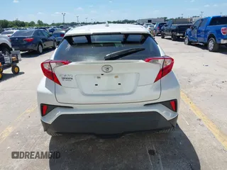 2021 Toyota C-HR LE with VIN JTNKHMBX8M1104427, listed as a IAAI auction lot 41948234 with 24,415 mi miles. Bid and sale history available at carsss.com. Image 16.