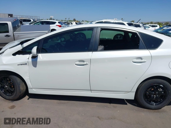 2012 Toyota Prius One with VIN JTDKN3DU3C5389068, listed as a IAAI auction lot 42145457 with 182,469 mi miles and . Bid and sale history available at DreamBid. Image 14.