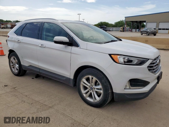 2020 Ford Edge SEL с VIN 2FMPK3J93LBB16928, выставлен на аукционе Copart как лот 63030385 с пробегом 81 567 миль миль и Чистый • Clean title. История ставок и продаж доступна на DreamBid. Изображение 4.