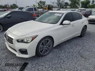 2014 Infiniti Q50 Hybrid Premium with VIN JN1AV7AP0EM692306, listed as a Copart auction lot 63067025 with 83,452 mi miles and Clean title. Bid and sale history available at DreamBid. Image 1.