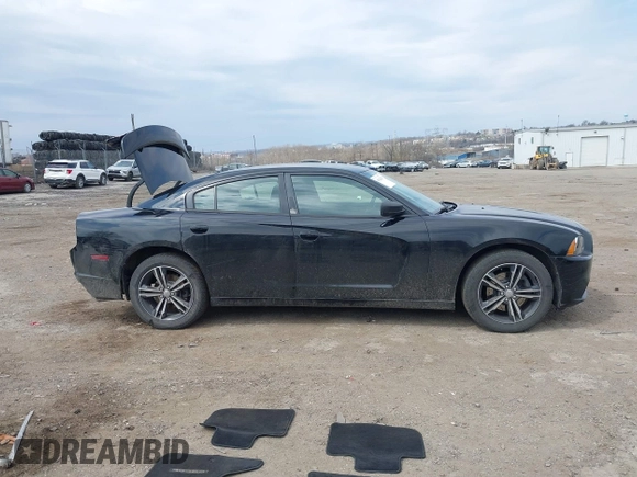 2014 Dodge Charger SXT Plus with VIN 2C3CDXJG2EH184239, listed as a IAAI auction lot 41912384 with 128,313 mi miles. Bid and sale history available at carsss.com. Image 14.