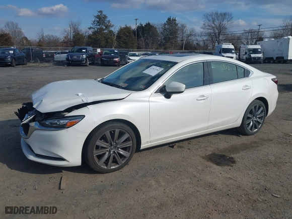 2021 Mazda Mazda6 Touring with VIN JM1GL1VM8M1615516, listed as a IAAI auction lot 41531402 with 59,585 mi miles. Bid and sale history available at carsss.com. Image 17.
