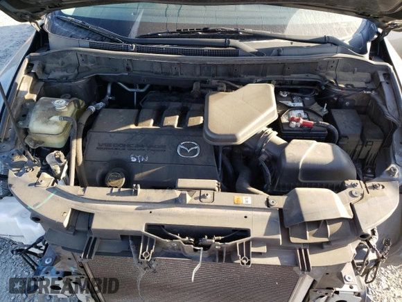 2015 Mazda CX-9 Grand Touring z VIN JM3TB3DV2F0456130, wystawiony jako Copart lot #60545095 z przebiegiem 120 892 mil mil oraz Szkoda całkowita • Salvage title. Historia ofert i sprzedaży dostępna na DreamBid. Obrazek 12.