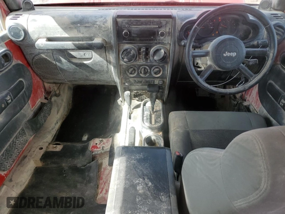 2009 Jeep Wrangler Unlimited X with VIN 1J4GZ39129L711934, listed as a Copart auction lot 47005105 with 423,135 mi miles and Salvage Title. Bid and sale history available at carsss.com. Image 8.