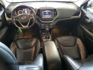 2015 Jeep Cherokee Limited z VIN 1C4PJMDS2FW735972, wystawiony jako Copart lot #55307765 z przebiegiem 104 025 mil mil oraz Szkoda całkowita • Salvage title. Historia ofert i sprzedaży dostępna na DreamBid. Obrazek 8.