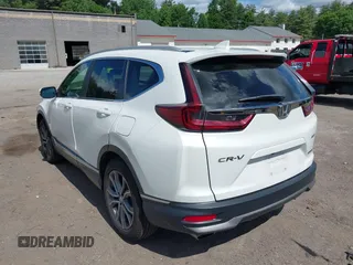 2022 Honda CR-V Touring with VIN 2HKRW2H91NH654021, listed as a IAAI auction lot 39517068 with 77,671 mi miles. Bid and sale history available at carsss.com. Image 3.