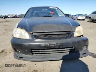 1998 Honda Civic CX with VIN 2HGEJ6325WH112575, listed as a Copart auction lot 77186644 with 147,976 mi miles and Salvage Title. Bid and sale history available at carsss.com. Image 5.