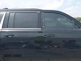 2019 Chevrolet Suburban LS with VIN 1GNSKGKC4KR128685, listed as a IAAI auction lot 42148721 with 92,346 mi miles and . Bid and sale history available at DreamBid. Image 14.