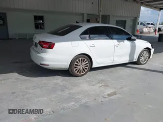 2016 Volkswagen Jetta Sedan 1.8T SEL with VIN 3VWL07AJ5GM310789, listed as a IAAI auction lot 41596429 with 169,910 mi miles. Bid and sale history available at carsss.com. Image 4.