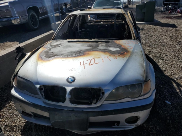2002 BMW 3 Series 330i with VIN WBAEV53472KM22788, listed as a Copart auction lot 42279083 with 0 mi miles and Salvage Title. Bid and sale history available at carsss.com. Image 5.