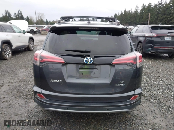 2018 Toyota RAV4 Hybrid SE with VIN JTMJJREV7JD208249, listed as a IAAI auction lot 41859301 with 91,899 mi miles and . Bid and sale history available at DreamBid. Image 16.
