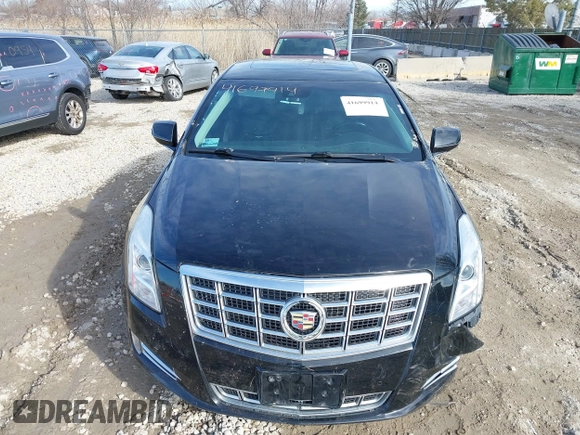 2015 Cadillac XTS Luxury z VIN 2G61N5S35F9155543, wystawiony jako IAAI lot #41699914 z przebiegiem 120 700 mil mil oraz . Historia ofert i sprzedaży dostępna na DreamBid. Obrazek 13.