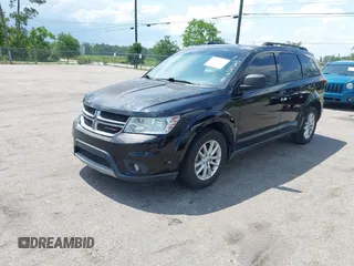 2015 Dodge Journey SXT z VIN 3C4PDCBG7FT658523, wystawiony jako IAAI lot #42490535 z przebiegiem 152 903 mil mil oraz . Historia ofert i sprzedaży dostępna na DreamBid. Obrazek 2.