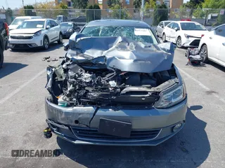 2013 Volkswagen Jetta Hybrid SE with VIN 3VW637AJ1DM232687, listed as a IAAI auction lot 41973407 with 70,428 mi miles and . Bid and sale history available at DreamBid. Image 12.