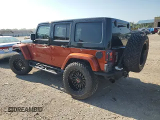 2012 Jeep Wrangler Unlimited Sport with VIN 1C4BJWDG0CL200802, listed as a Copart auction lot 63822365 with 116,501 mi miles and Salvage title. Bid and sale history available at DreamBid. Image 2.