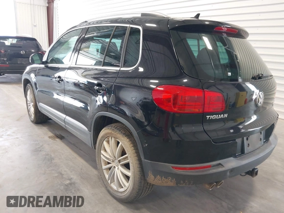 2012 Volkswagen Tiguan SE with VIN WVGBV7AX2CW503301, listed as a IAAI auction lot 42679407 with 90,603 mi miles and . Bid and sale history available at DreamBid. Image 3.