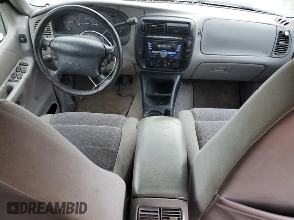 1998 Ford Explorer XLT with VIN 1FMZU32P0WUD21265, listed as a Copart auction lot 73702364 with 211,096 mi miles and Salvage title. Bid and sale history available at DreamBid. Image 8.