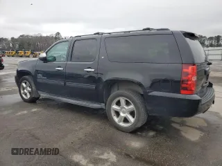 2014 Chevrolet Suburban LT with VIN 1GNSCJE05ER138819, listed as a Copart auction lot 43324175 with 218,114 mi miles and Salvage Title. Bid and sale history available at carsss.com. Image 2.
