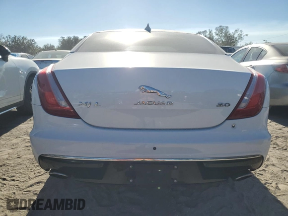 2016 Jaguar XJ Portfolio with VIN SAJWA2G72G8W00103, listed as a Copart auction lot 81347664 with 45,917 mi miles and Salvage title. Bid and sale history available at DreamBid. Image 6.