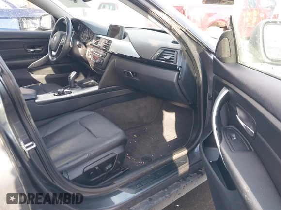 2015 BMW 4 Series 428i xDrive with VIN WBA4C9C55FD331207, listed as a IAAI auction lot 41636906 with 131,306 mi miles and . Bid and sale history available at DreamBid. Image 5.