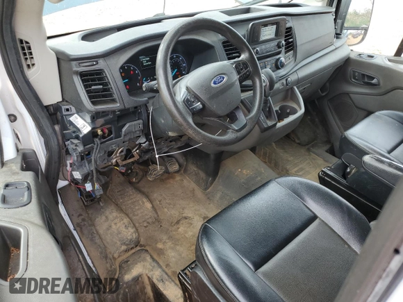 2021 Ford Transit Cargo with VIN 1FTBR1C86MKA01959, listed as a Copart auction lot 50876485 with 140,457 mi miles and Salvage Title. Bid and sale history available at DreamBid. Image 8.
